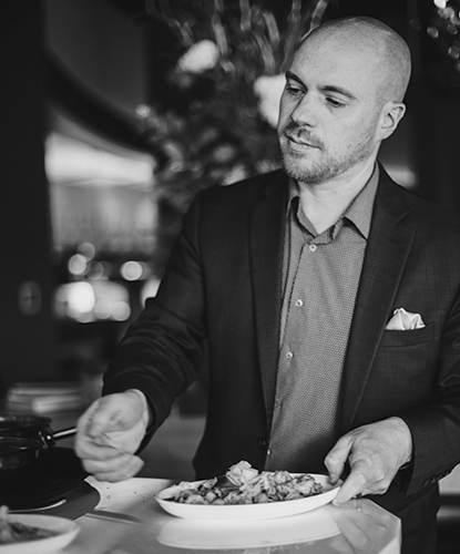 Keith Moorehead, general manager of Martini Modern Italian, enjoys a meal.