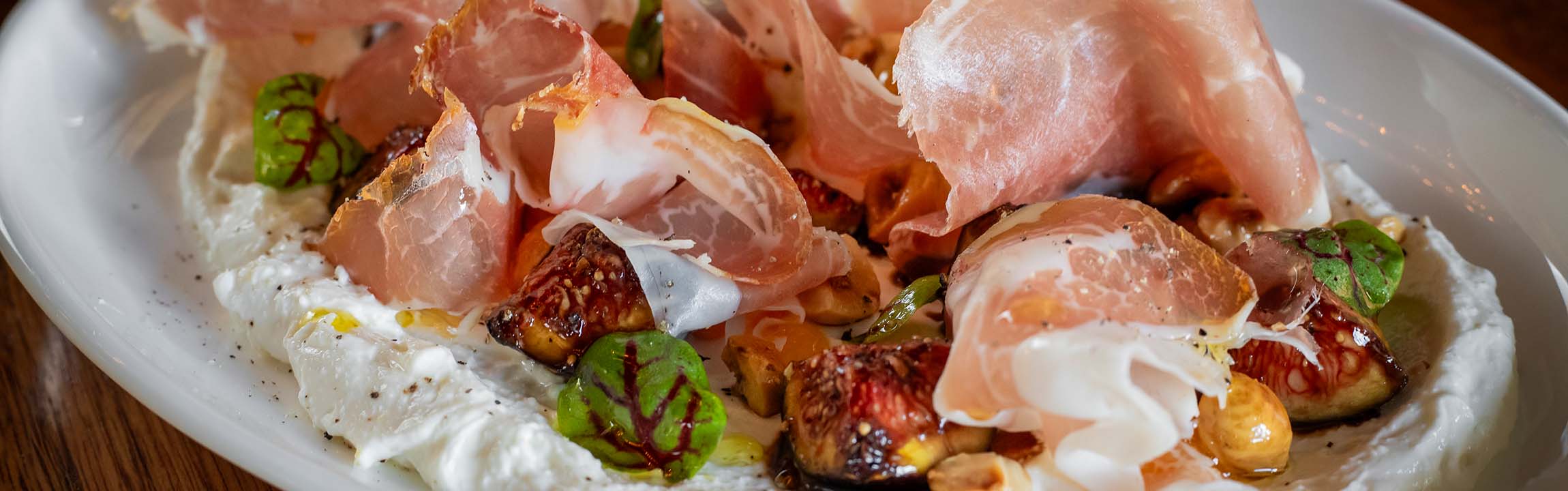 Close up of prosciutto and figs from Martini Modern Italian.